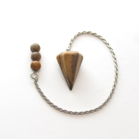 PÉNDULO PIEDRA MADERA PETRIFICADA O XILÓPALO