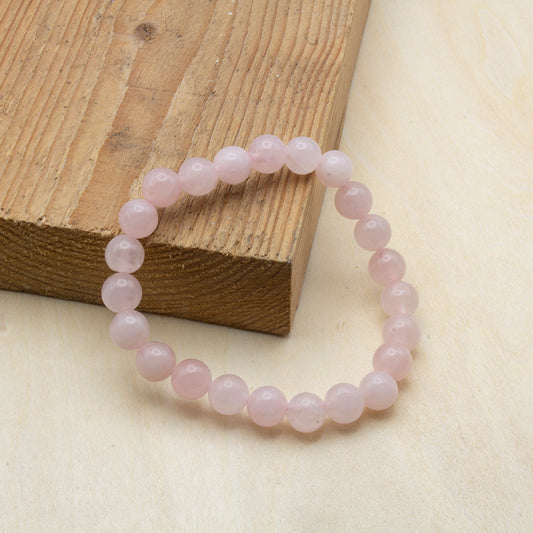 Pulsera de cuarzo rosa natural en cuentas energéticas para amor y equilibrio emocional.