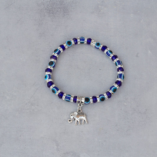Pulsera ojo turco con amuleto elefante en acero – protección y buena suerte