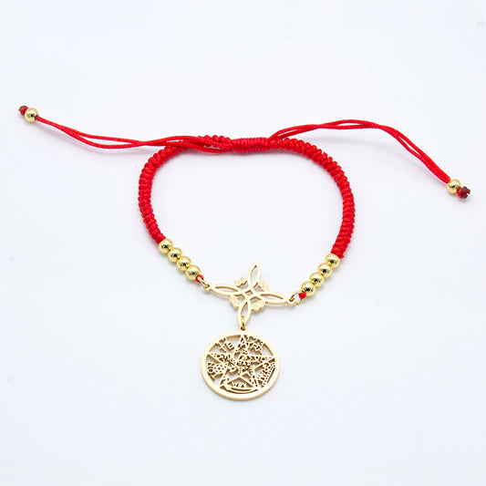 Pulsera Tetragrámaton y Nudo de Bruja en acero inoxidable dorado con hilo rojo trenzado y cuentas doradas.