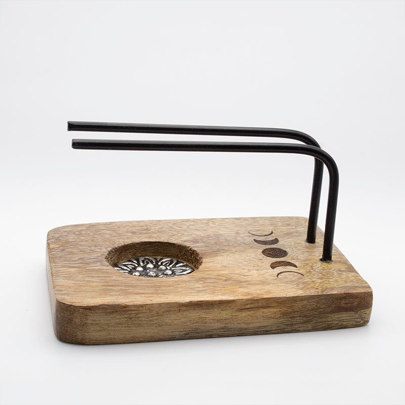 Soporte quemador de madera natural para Palo Santo con varillas negras.