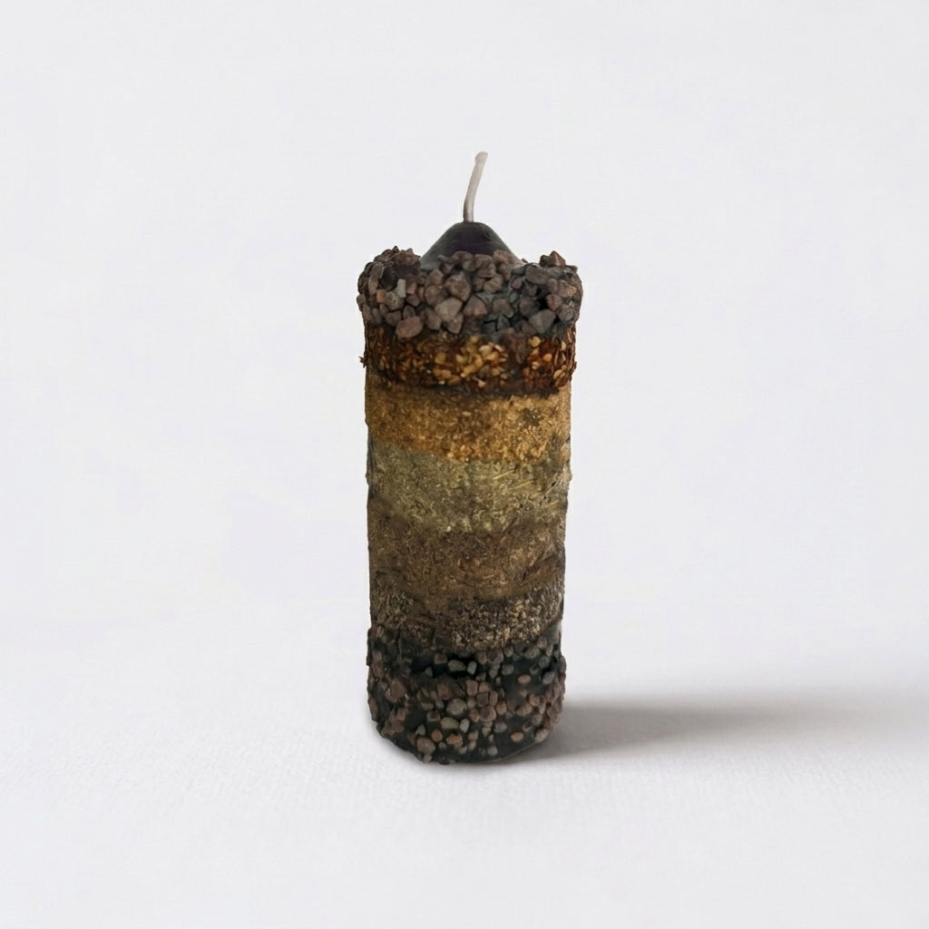 Velón 7 Víboras ritualizado para cortar magia negra, limpieza energética y protección espiritual.