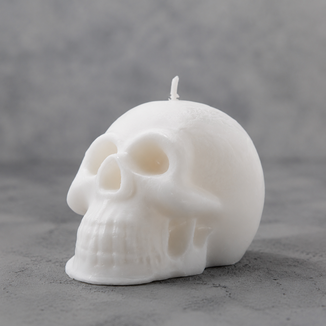 Velón Cráneo Santa Muerte Blanca ritualizado para salud, protección y limpieza espiritual